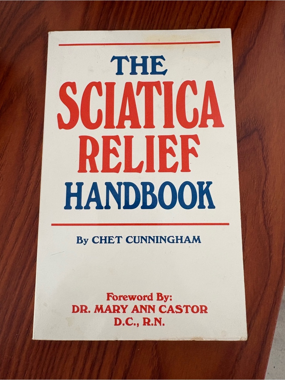 The Sciatica Relief Handbook by Chet Cunningham - White & Red Cover